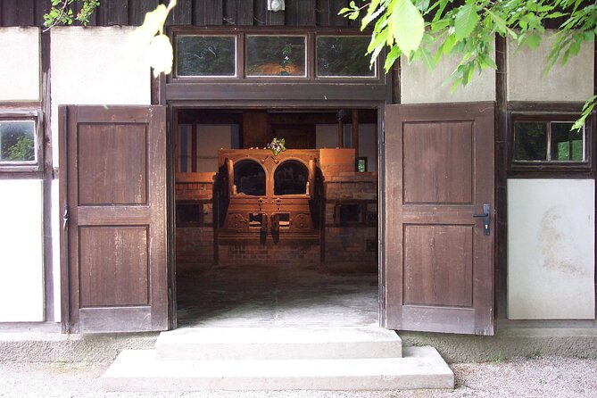 Dachau Concentration Camp Memorial Tour with Train from Munich - Barracks, cells, and prisoner stories