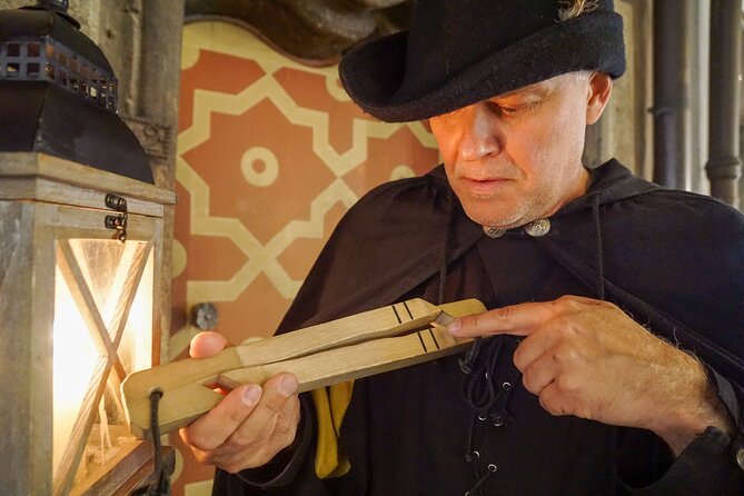 Medieval city tour with night watchman in Munich in German - A medieval cemetery beneath Petersplatz