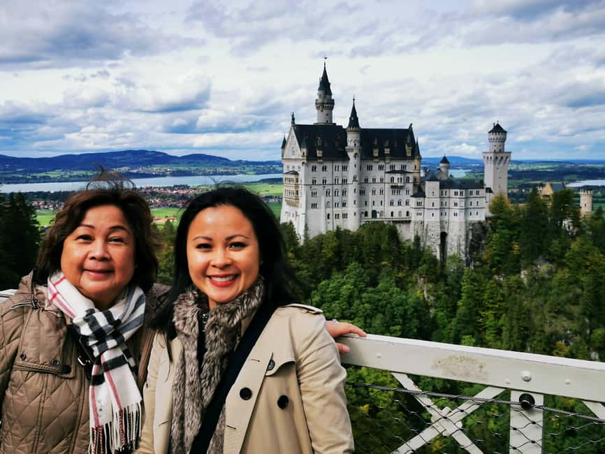 Munich: Neuschwanstein Castle by Bus with Alpine Bike Ride - A summer swim with a castle view
