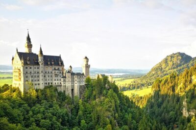 Munich private Car & Walking Tour incl. BMW World & River Surfers