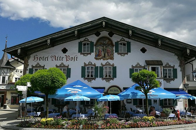 Munich private Car & Walking Tour incl. BMW World & River Surfers - The Zugspitze and Alpine coaster choices