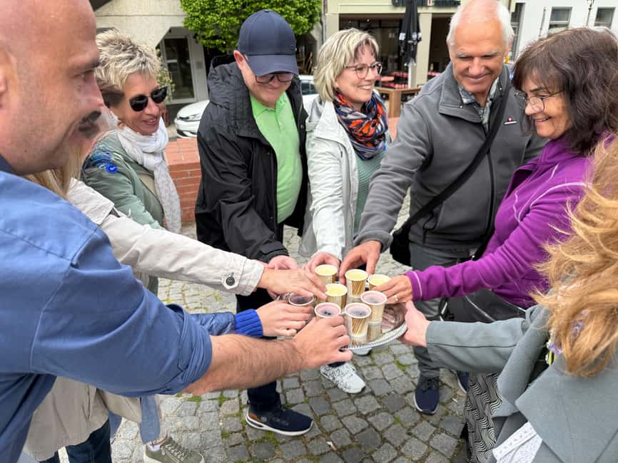 Munich: Viktualienmarkt Food Tasting Tour in German - Bread and pretzel show two sides of Munich’s bakery culture