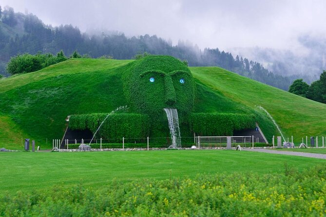 MY <em> GUiDE EXCLUSiVE PANORAMA alpine tour to INNSBRUCK (/ Swarovski) from Munich – Key points at a glance’ /></p>
<ul>
<li><strong>Private travel in a new minivan:</strong> Only your group joins the excursion, with air conditioning, leather seating, panoramic glass, and mineral water.</li>
<li><strong>Two excellent lake stops:</strong> Tegernsee in Bavaria and Achensee in Tyrol bring very different views and local stories.</li>
<li><strong>A guided Innsbruck walk:</strong> The 35-minute old-town tour includes the Golden Roof, Hofburg, Maria-Theresia-Strasse, the Cathedral of St. James, and more.</li>
<li><strong>Optional mountain lift:</strong> The Nordkette cable cars can carry you as high as 2,269 meters for broad views over Innsbruck.</li>
<li><strong>A thoughtful return route:</strong> Mittenwald, Ludwigstrasse, the Bergisel ski jump, and Garmisch-Partenkirchen add culture and modern history.</li>
<li><strong>A high price for convenience:</strong> The cost makes most sense for a private group that values flexibility over a cheaper shared excursion.</li>
</ul>
<h2>Why this Munich to Innsbruck route works</h2>
<p><img width="669" height="446" decoding="async" src=